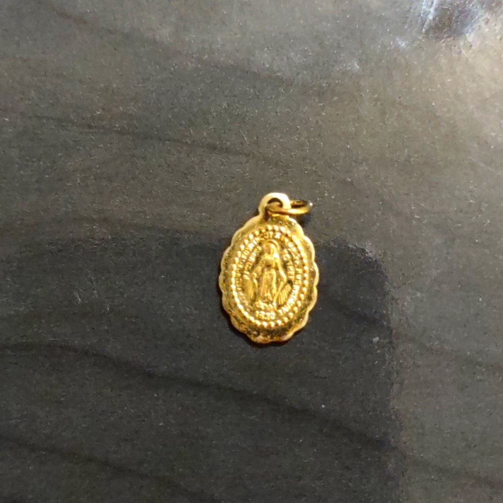 Gold Mary pendant baptism